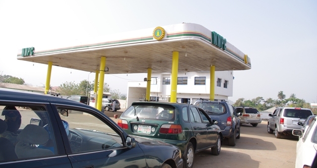 NNPC Releases 250 Trucks of Petrol to Address Fuel Scarcity In Lagos Queues building up at NNPC Poly Road while selling fuel at N87 per litre before ajusting its metres on MondayAdo Ekiti on Sunday - NNPC Releases 250 Trucks of Petrol to Address Fuel Scarcity In Lagos