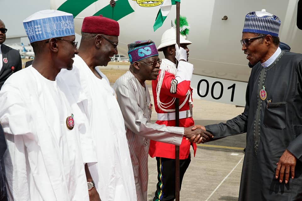 PHOTOS: President Buhari Returns to Abuja After Participation at 5th AU-EU Summit In Abidjan