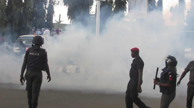 Police Disperse Supporters with Teargas at PDP Rally In Jigawa Police Disperse Supporters with Teargas at PDP Rally In Jigawa