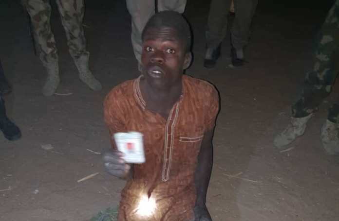 Nigerian Troops Arrest Boko Haram Terrorist While Hiding in a House Wanted boko haram terrorist arrested OkayNG - Nigerian Troops Arrest Boko Haram Terrorist While Hiding in a House