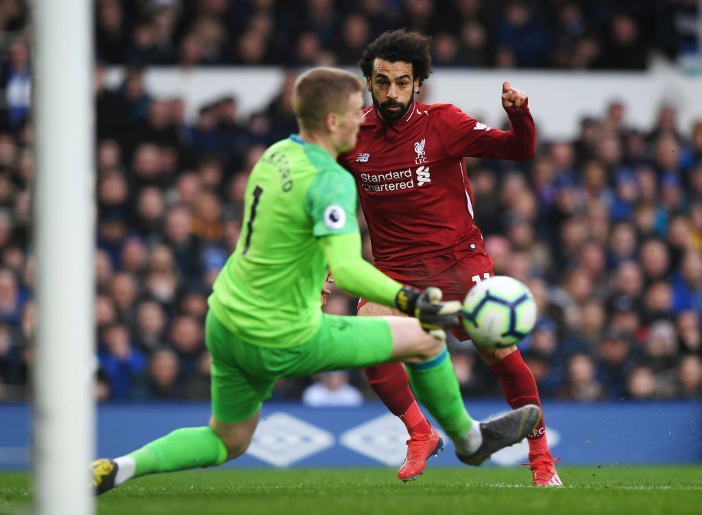 Mohamed Salah and Jordan Pickford