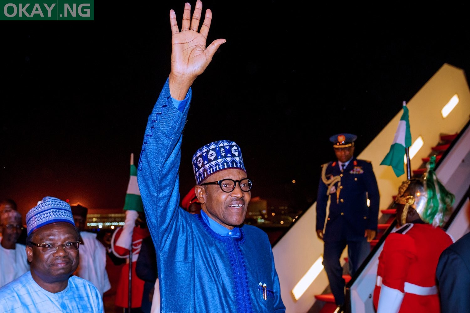 Buhari returns to Abuja after London trip [Photos from Bayo Omoboriowo]