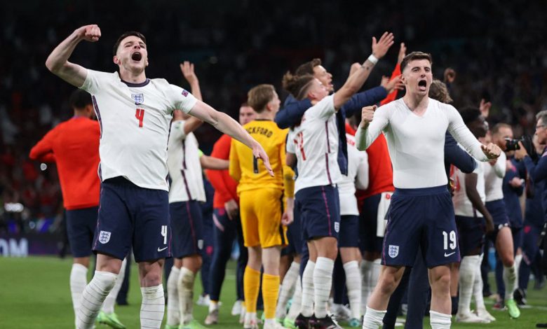 England’s players celebrate their win in the UEFA EURO 2020 semi-final football match between England and Denmark at Wembley Stadium in London on July 7, 2021.