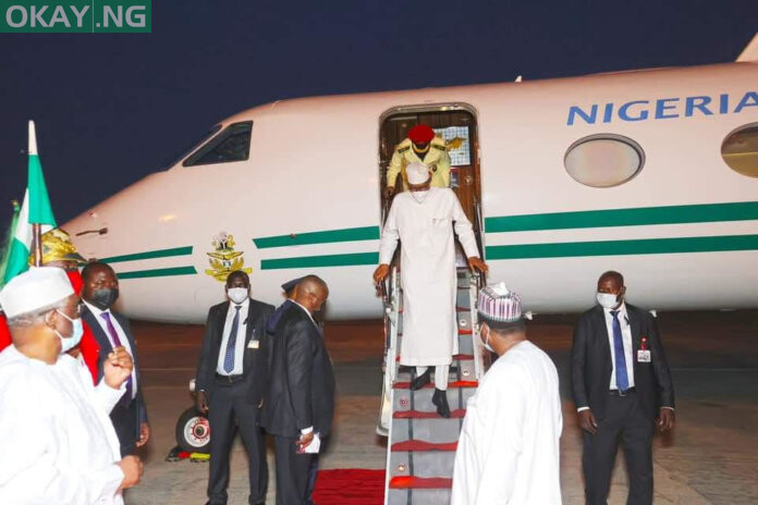 PHOTOS: Buhari returns to Abuja after trip to Saudi Arabia