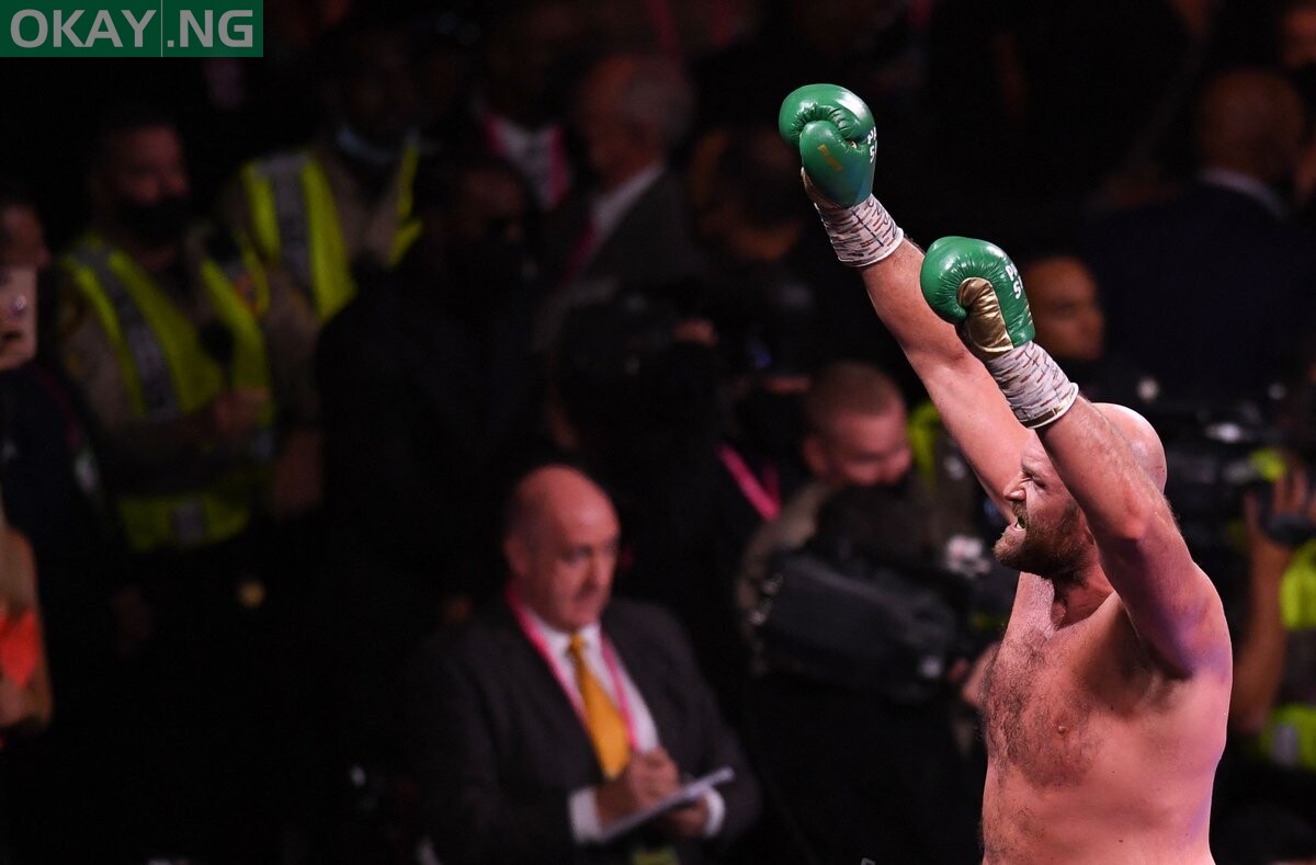 WBC heavyweight champion Tyson Fury of Great Britain reacts after his victory against US challenger Deontay Wilder in the 11th round of the fight for the WBC/Lineal Heavyweight title at the T-Mobile Arena in Las Vegas, Nevada, October 9, 2021. (Photo by Robyn Beck / AFP)