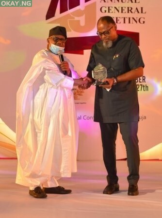 L-R; President, Manufacturing Association of Nigeria, Engr. Mansur Ahmed presenting the recognition award to Managing Director, Shell Nigeria Gas, Ed Ubong.