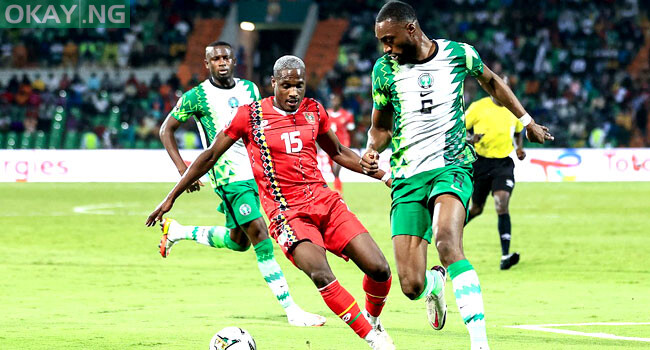 Nigeria’s defender Semi Ajayi (R) fights for the ball with Guinea-Bissau’s forward Jefferson Encada during the Group D Africa Cup of Nations (AFCON) 2021 football match at Stade Roumde Adjia in Garoua on January 19, 2022. Daniel BELOUMOU OLOMO / AFP