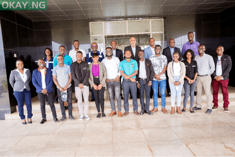 Some members of Dangote Cement Zambia Limited posing with the graduate trainees selected for the two year contract