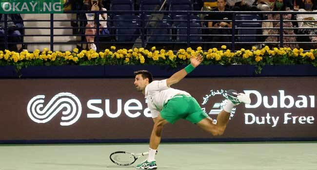 Serbia’s Novak Djokovic returns the ball to Czech Republic’s Jiri Vesely during their quarter-final match at the ATP Dubai Duty-Free Tennis Championship, in the Gulf emirate on February 24, 2022. Karim SAHIB / AFP
