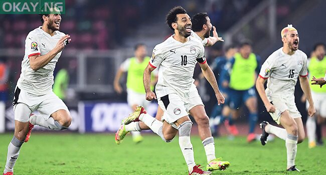 Egypt’s forward Mohamed Salah (C) celebrates with teammates after winning the Africa Cup of Nations (CAN) 2021 semi-final football match between Cameroon and Egypt at Stade d’Olembe in Yaounde on February 3, 2022. CHARLY TRIBALLEAU / AFP