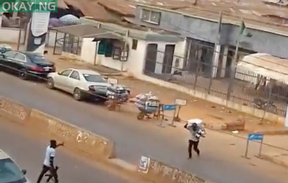Scene of the robbery: One robber carrying a sac filled with money