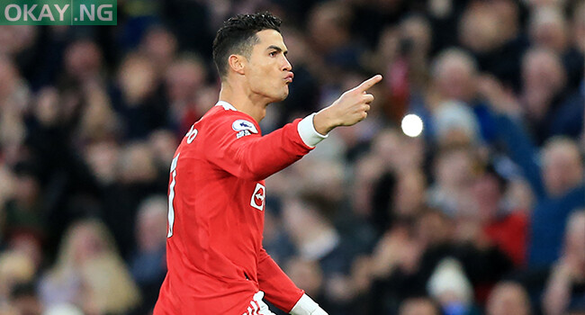 Manchester United’s Portuguese striker Cristiano Ronaldo celebrates after scoring the opening goal during the English Premier League football match between Manchester United and Tottenham Hotspur at Old Trafford in Manchester, north west England, on March 12, 2022. Lindsey Parnaby / AFP