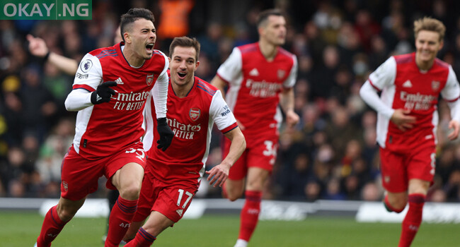 Arsenal’s Brazilian striker Gabriel Martinelli (L) celebrates after scoring his team third goal during the English Premier League football match between Watford and Arsenal at Vicarage Road Stadium in Watford, north-west of London on March 6, 2022. Adrian DENNIS / AFP