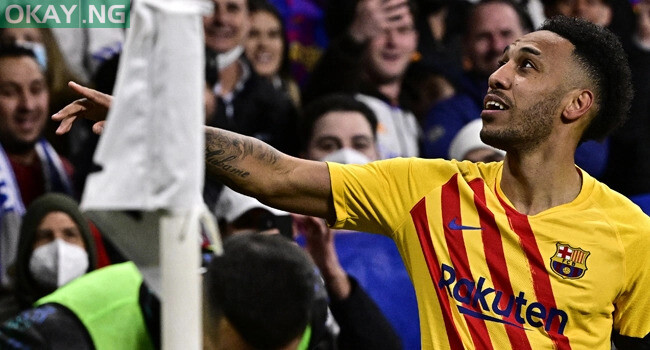 Barcelona’s Gabonese midfielder Pierre-Emerick Aubameyang celebrates after scoring a goal during the Spanish League football match between Real Madrid CF and FC Barcelona at the Santiago Bernabeu stadium in Madrid on March 20, 2022. JAVIER SORIANO / AFP
