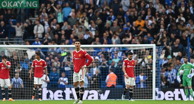 Manchester United’s Portuguese striker Cristiano Ronaldo (C) and teammates react as another goal goes in for Brighton during the English Premier League football match between Brighton and Hove Albion and Manchester United at the American Express Community Stadium in Brighton, southern England on May 7, 2022. Glyn KIRK / AFP