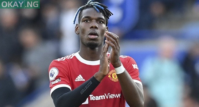 Manchester United’s French midfielder Paul Pogba applauds the fans at the end of the English Premier League football match between Leicester City and Manchester United at King Power Stadium in Leicester, central England on October 16, 2021. (Photo by Paul ELLIS / AFP)