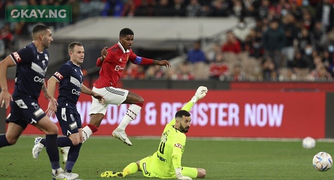 Marcus Rashford (C) of Manchester United scores a goal during the exhibition football match between English Premier League team Manchester United and Melbourne Victory at the Melbourne Cricket Ground on July 15, 2022, in Melbourne. (Photo by Martin KEEP / AFP)