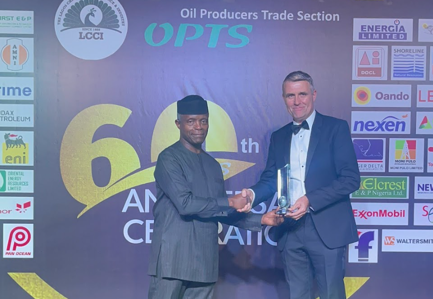 Vice President Prof. Yemi Osinbajo present an award to Mr. Mike Sangster, MD, TotalEnergies at the 60th-anniversary celebration of OPTS at Eko Hotel, Lagos on Thursday.