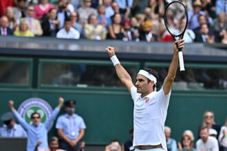In this file photo, Switzerland’s Roger Federer celebrates his victory over Britain’s Cameron Norrie during their men’s singles third-round match on the sixth day of the 2021 Wimbledon Championships at The All England Tennis Club in Wimbledon, southwest London, on July 3, 2021. Ben STANSALL / AFP