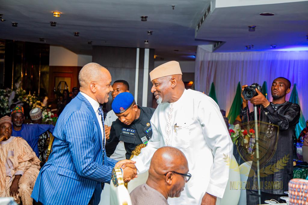 Minister of Transportation, Muazu Jaji Sambo(right) and Director General, Nigerian Maritime Administration and Safety Agency (NIMASA) Dr Bashir Jamoh OFR exchanging pleasantries during a reception in honour of the Dr Jamoh over his conferment of Officer of the Federal Republic by President Muhammadu Buhari.