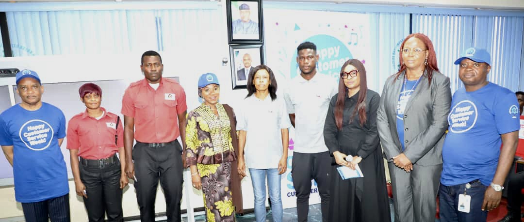 Director General, Nigerian Maritime Administration and Safety Agency (NIMASA), Dr.Bashir Jamoh (left); National Coordinator/CEO SERVICOM, Mrs Nnenna Akajemeli (4th left); Facilitator, Ms Nikru Oguadinma (3rd right); Director SERVICOM NIMASA, Mrs. Bolaji Kehinde (2nd right); Deputy Director SERVICOM NIMASA, Mr Paul Agim and support staff of the Agency during the 2022 Customer Service Week Celebration at the NIMASA headquarters in Lagos.