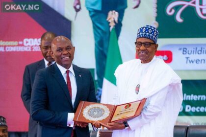 President Muhammadu Buhari, presenting the 2022 Nigerian Army Recognition Award to Tony O. Elumelu, the Chairman of Heirs Holdings, United Bank for Africa Plc and Transcorp Nigeria Plc