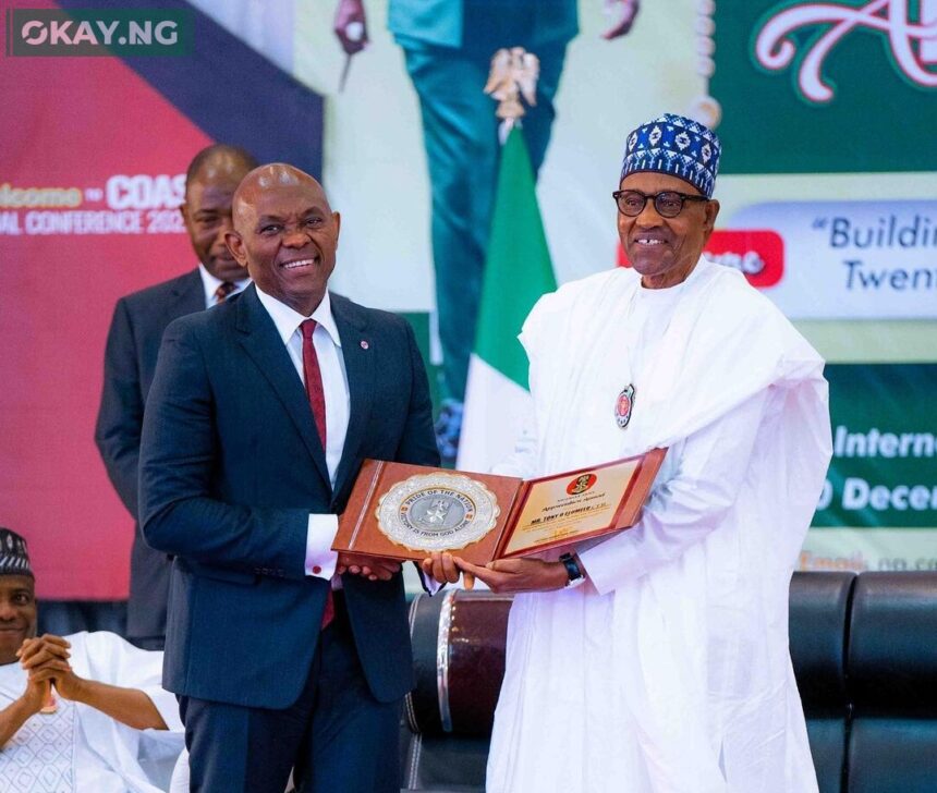 President Muhammadu Buhari, presenting the 2022 Nigerian Army Recognition Award to Tony O. Elumelu, the Chairman of Heirs Holdings, United Bank for Africa Plc and Transcorp Nigeria Plc