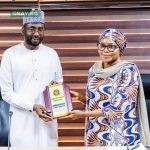 DG NITDA, Kashifu Inuwa CCIE (left), receiving an award for an Ambassador of Basic Education from the ES UBEC, Hajia Aisha Garba (right)